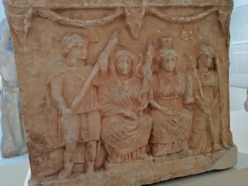 Stone carving of goddesses and gods